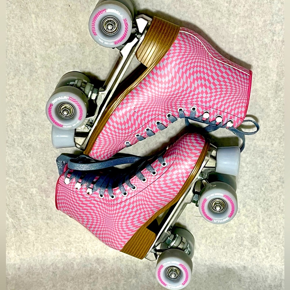 Impala Pink Checkered Derby Roller Skates, used